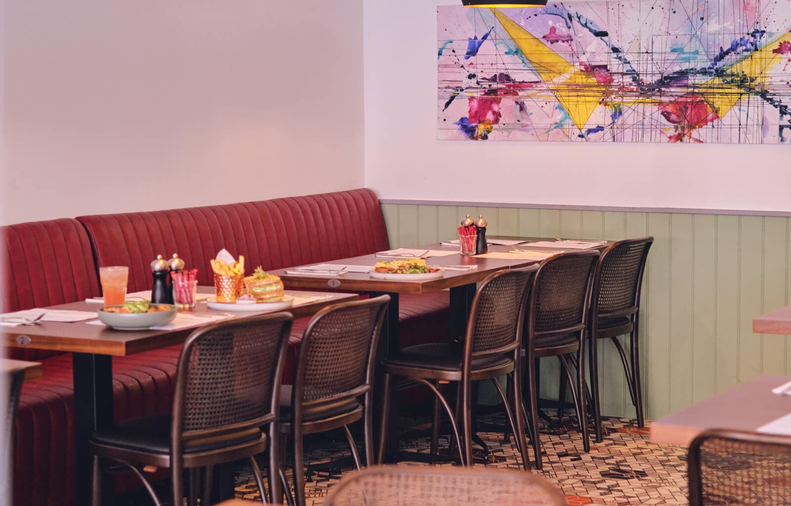 The dining room with its red banquettes